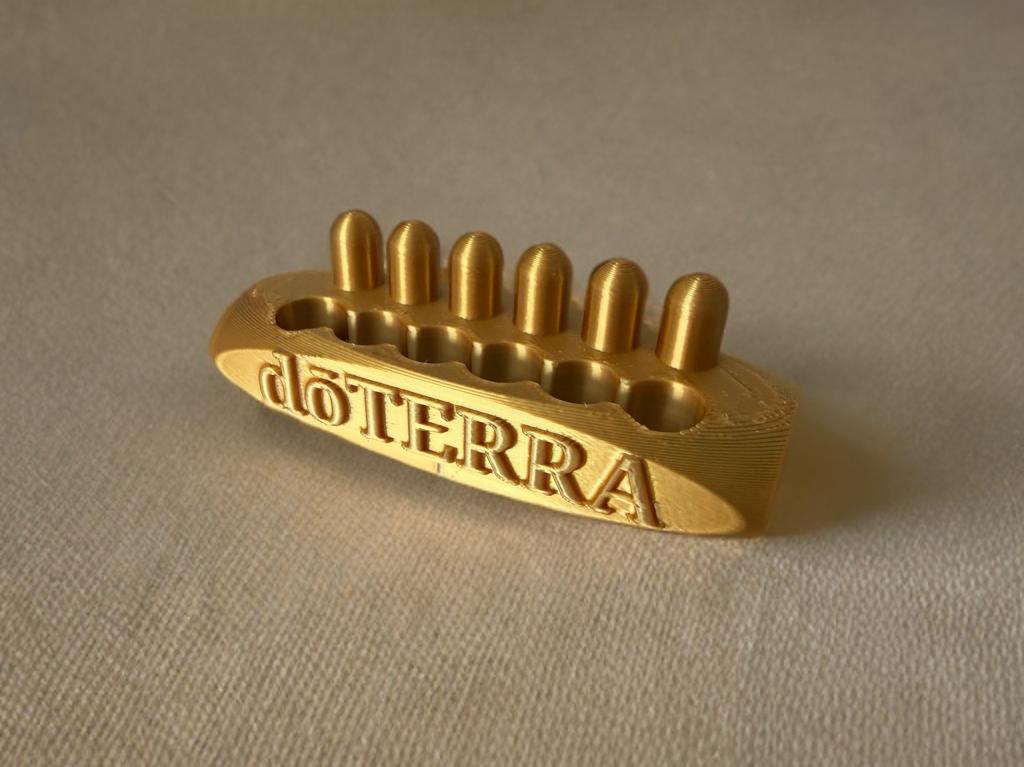 Suport capsule auriu